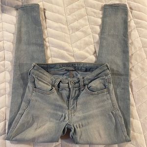 AMERICAN EAGLE JEANS SIZE 0 SKINNY LONG JEANS, LOW WAIST, BABY BLUE